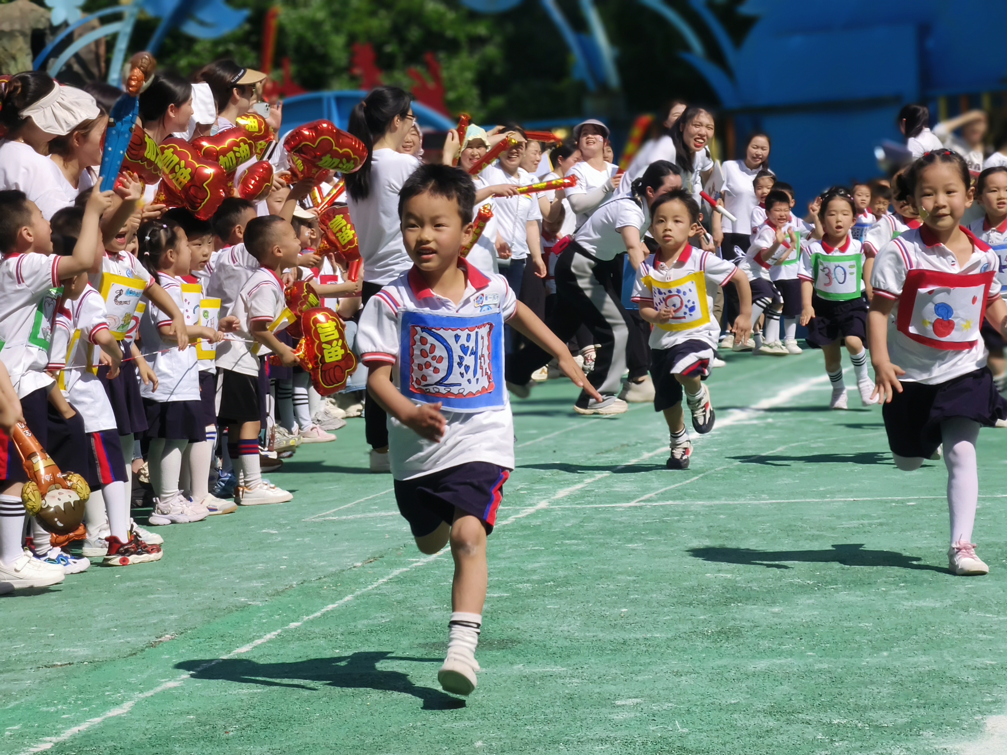 “重”情七运会家园向未来合川新华小学附属幼儿园亲子运动会乐翻天