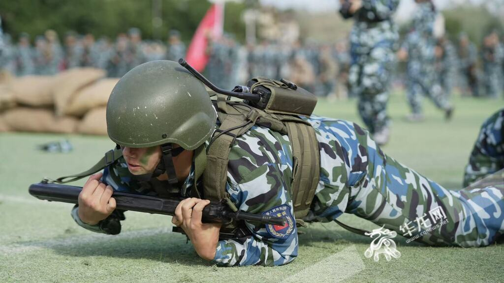 A student crawling forward in tactical confrontation