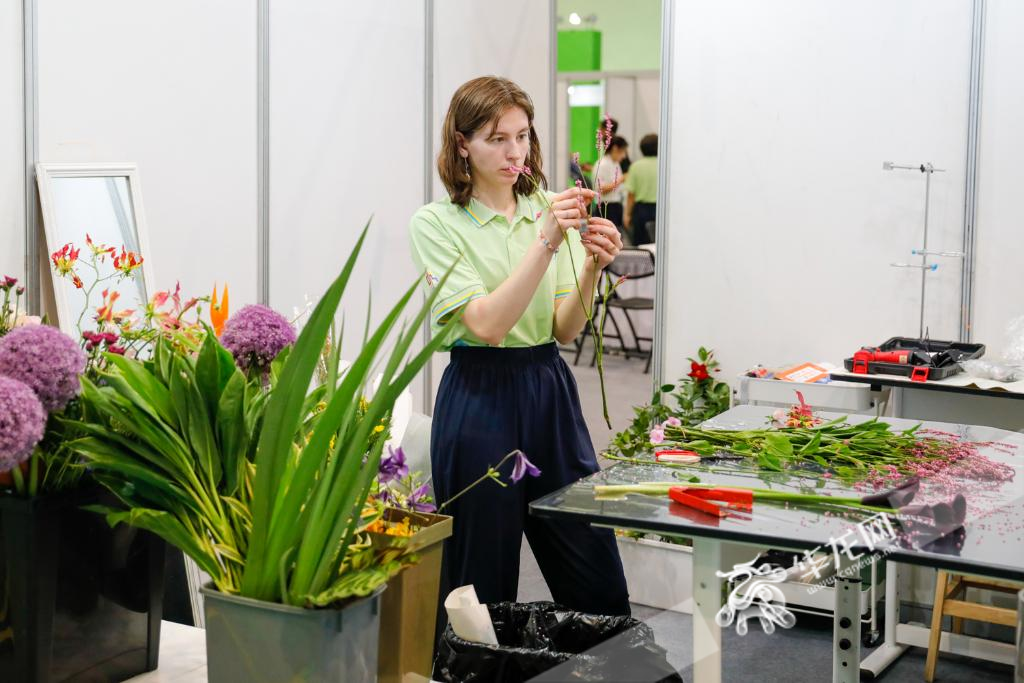 A foreign competitor was competing in the Floral Competition Event.