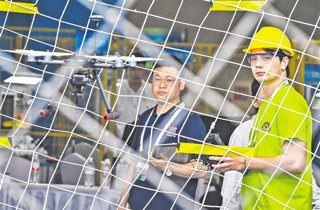 Competitors were in the Drone Installation and Overhaul Competition Event on June 25. (Photographed by Long Fan / Visual Chongqing)