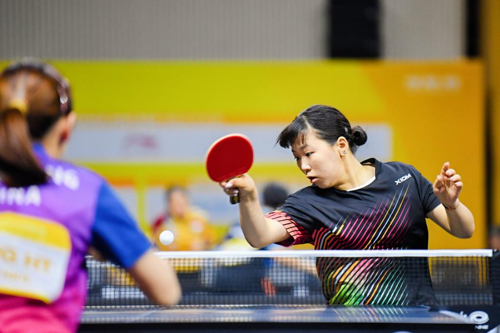 Players competed on the table tennis court.