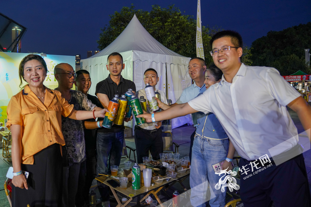 People enjoying beer and snacks at the Music and Beer Festival