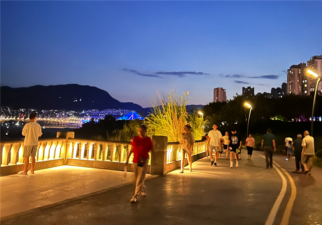 The park becoming more pleasant under the night sky and lights