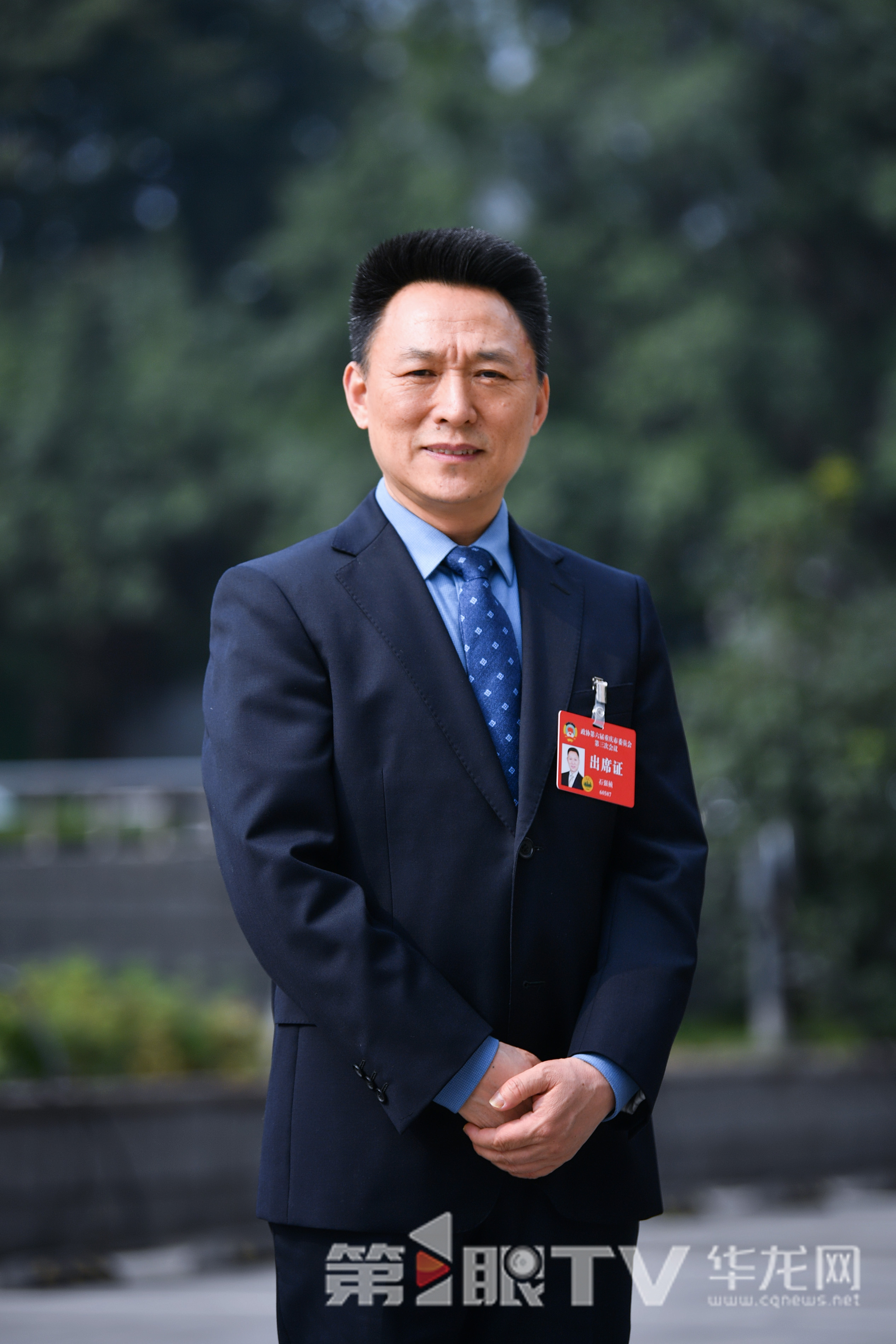 市政协委员,市体育局党组成员、副局长石强桢。。第1眼TV-华龙网记者 李一鸣 摄