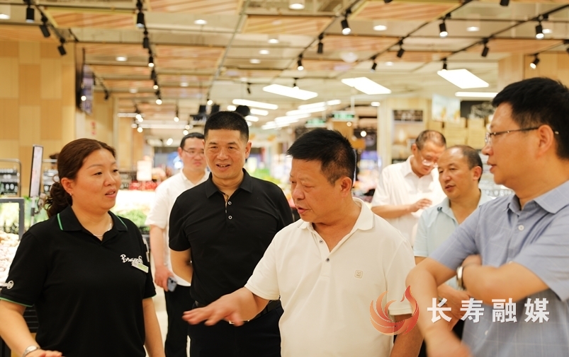 区人大常委会调研商贸工作2