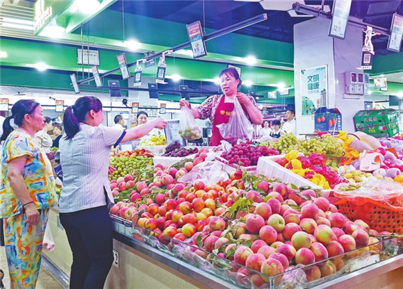 智慧化菜市场带来购物新体验。通讯员 廖松 摄