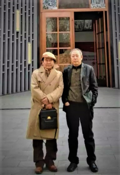 梅忠智与李翔在北京合影。