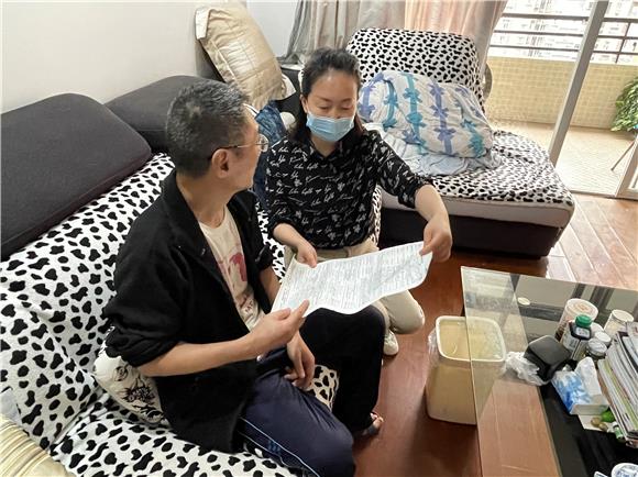 冉家坝社区开展“促进残疾人就业 维护残疾人权益”活动。通讯员 尹欢欢 摄