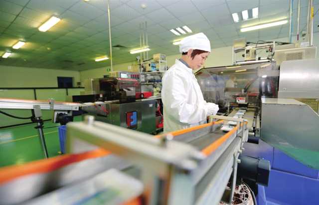 重庆多普泰制药股份有限公司生产线。王泸州 摄