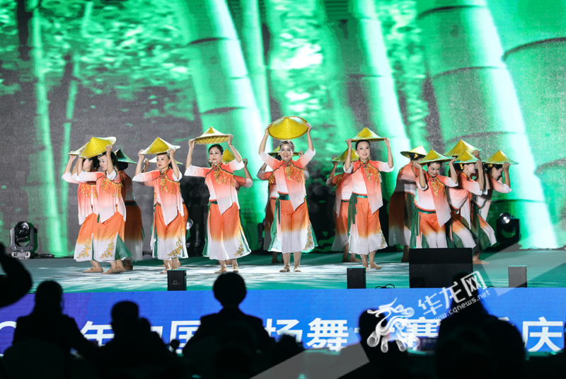 Sichuan dancing team performing on stage in addition to Chongqing dancing teams