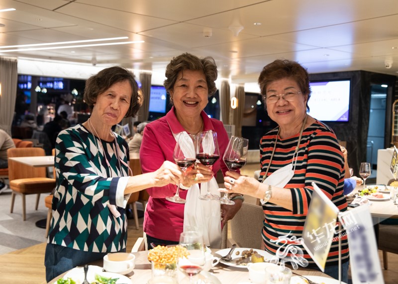  Thai tourists enjoying delicious food on the cruise ship.
