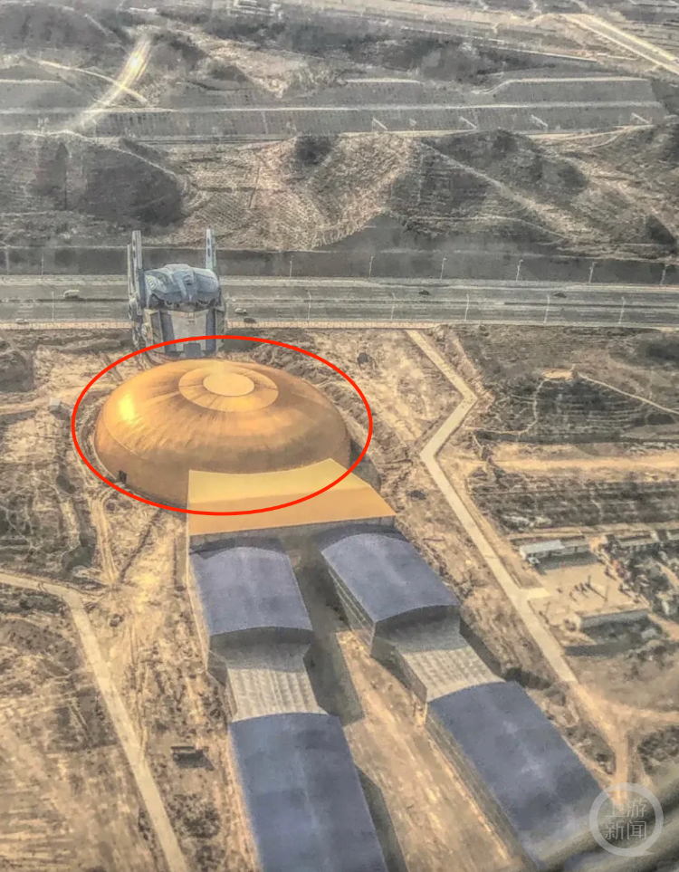 兰州一地现巨型“怀孕”擎天柱，回应：系在建影视城，“大肚子”是星空馆1