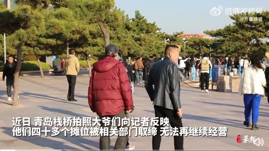 青岛栈桥拍照大爷被要求停止营业 海鸥回来了青岛栈桥拍照大爷消失了2