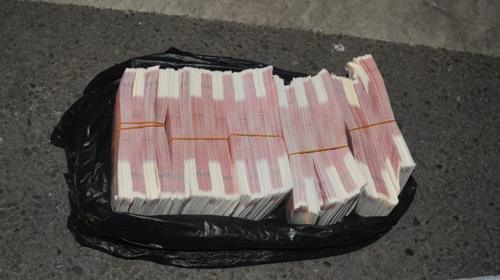 重庆警方破获特大伪造货币案 收缴假币210余万元