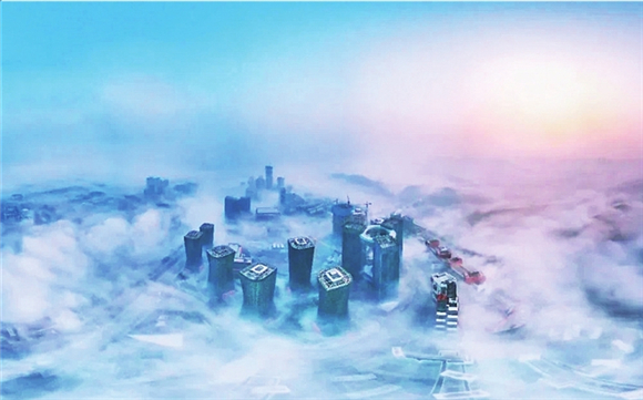 辰时 刚睡醒的城市笼罩在云雾中，宛如海市蜃楼。胡德友 摄