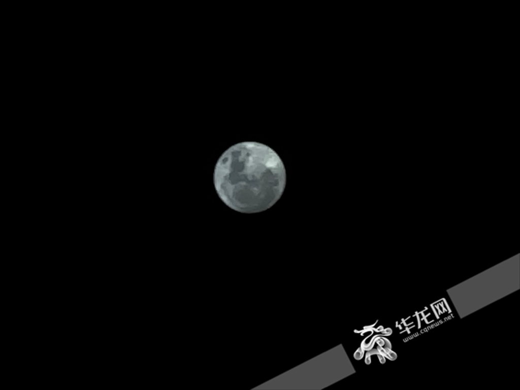 The beautiful full moon above the city of Hechuan, Chongqing.
