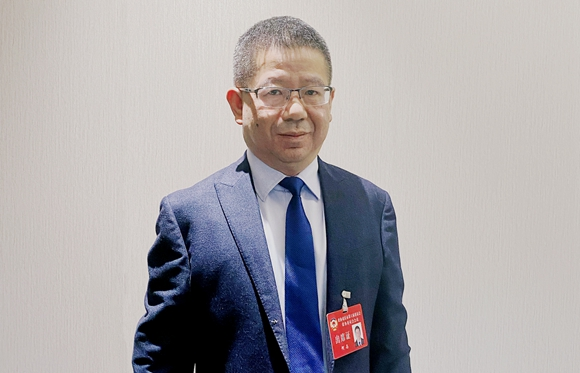重庆市政协委员、欧菲斯集团股份有限公司总经理何志。受访者供图
