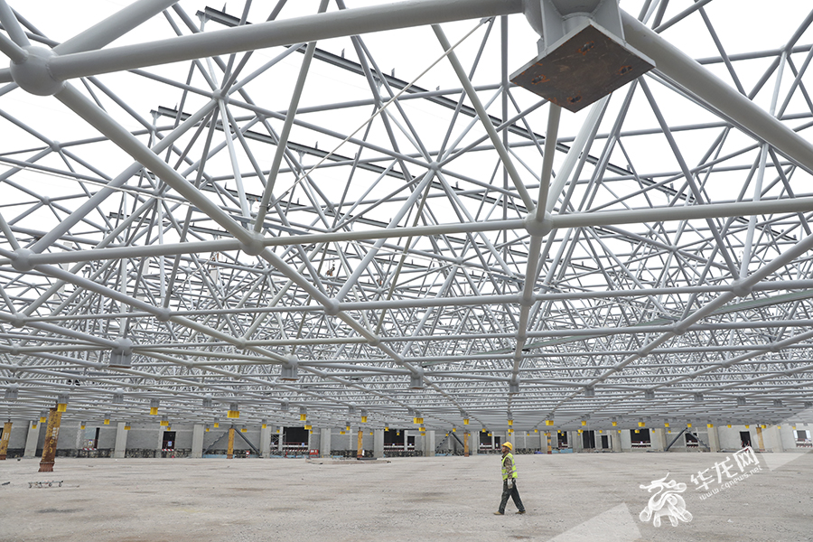 The steel space frame is larger than a standard football field and heavier than eight Boeing 767 airliners.